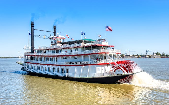Riverboat cruising on the Mississippi River in New Orleans.