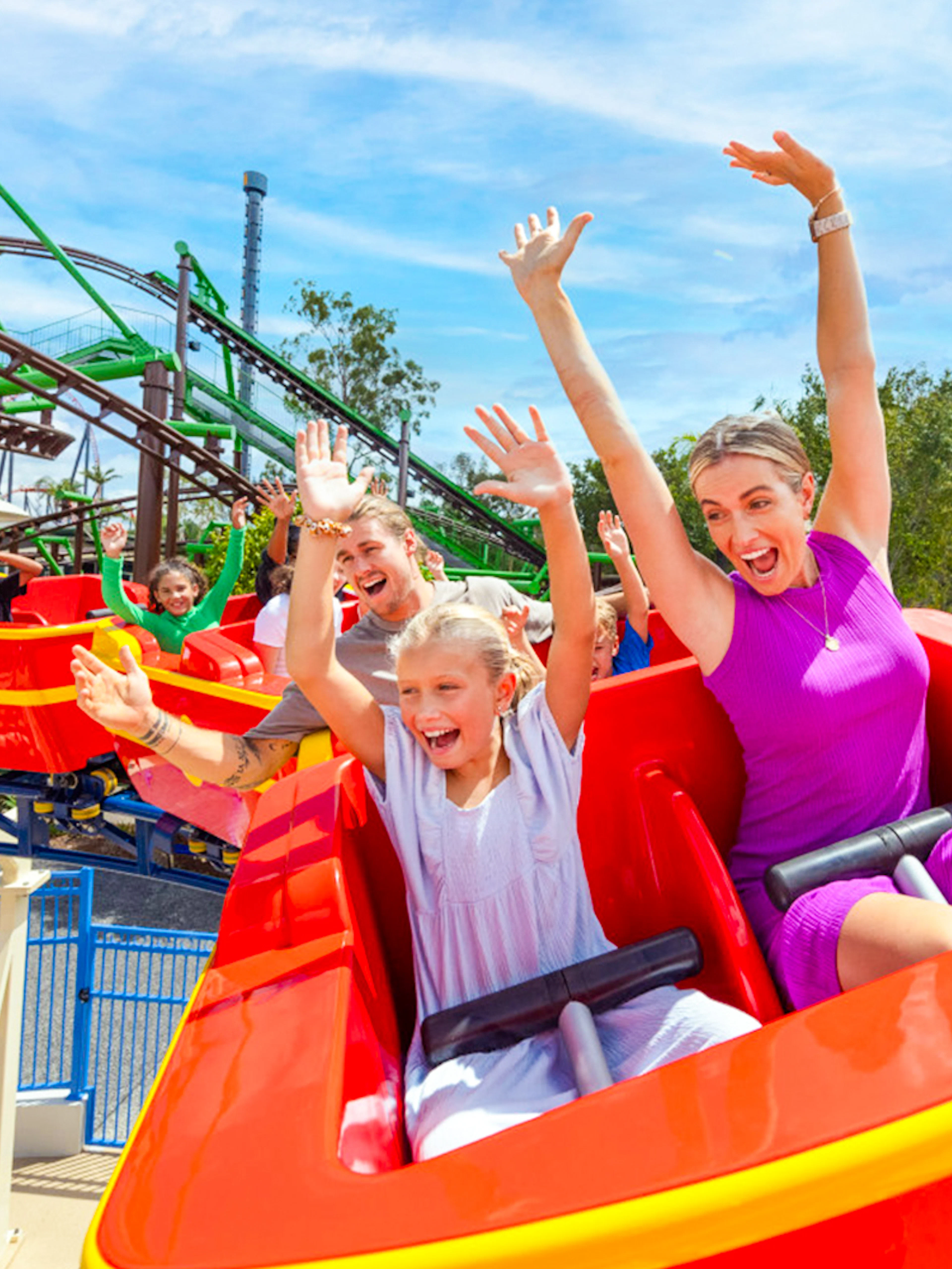 People enjoying a roller coaster ride at Dreamworld, Gold Coast.