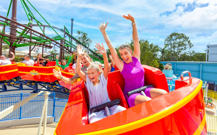 People enjoying a roller coaster ride at Dreamworld, Gold Coast.