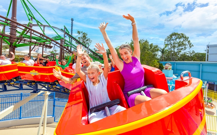 People enjoying a roller coaster ride at Dreamworld, Gold Coast.