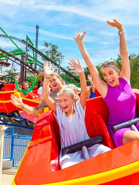 People enjoying a roller coaster ride at Dreamworld, Gold Coast.