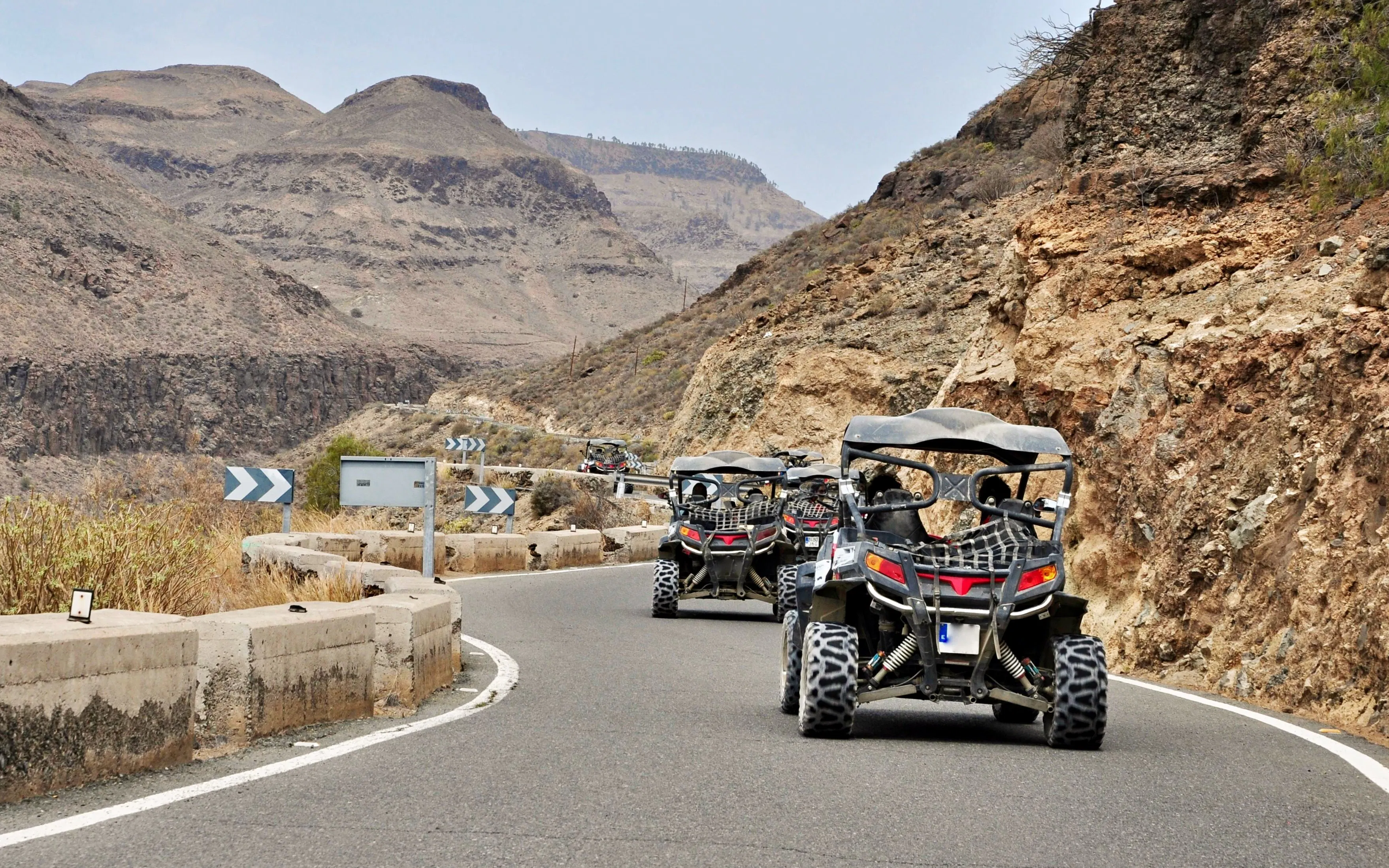 Buggy tour on winding mountain road in Gran Canaria.