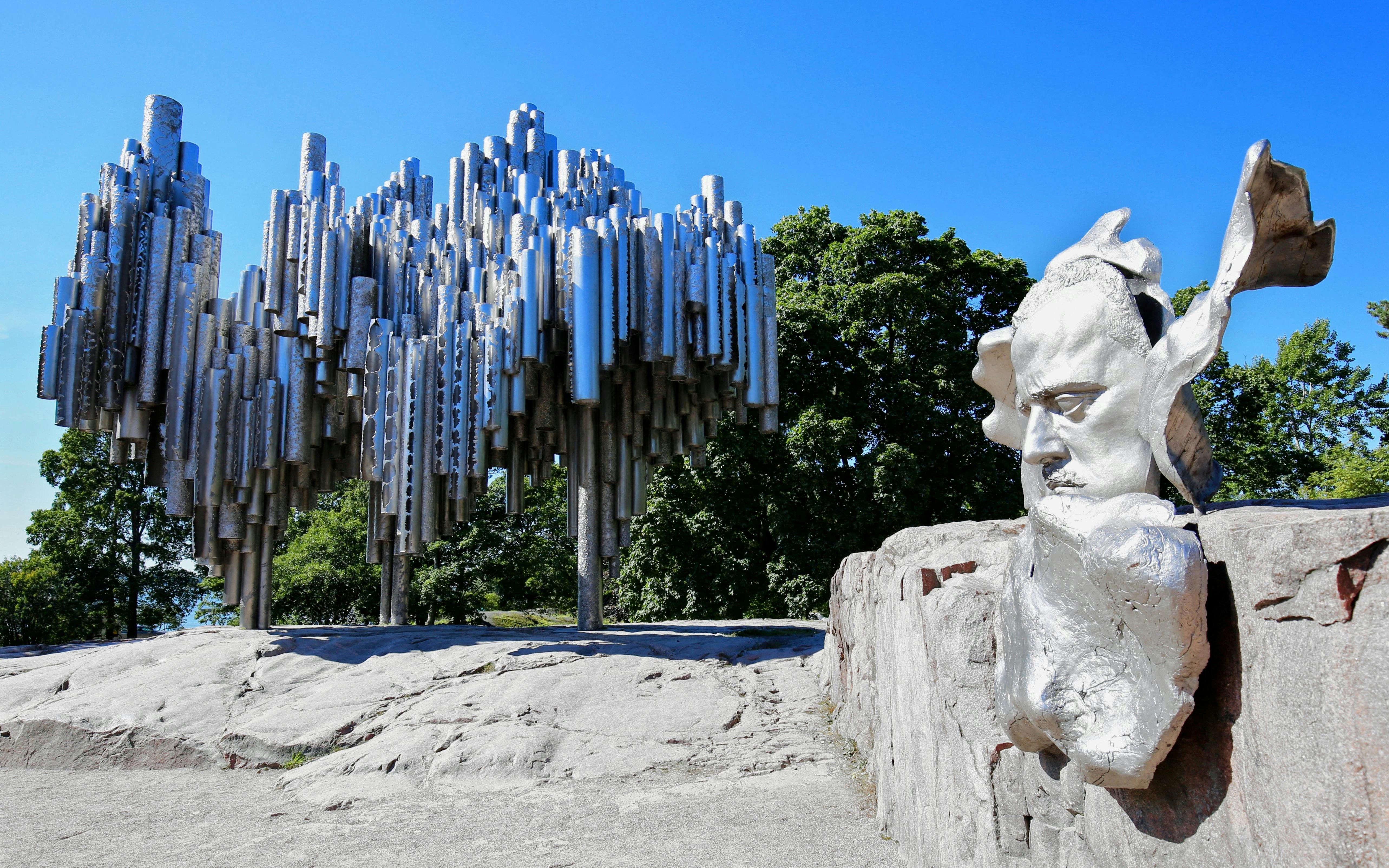 Sibelius Monument with abstract pipes and Sibelius's face sculpture in Helsinki, Finland.