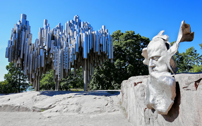 Sibelius Monument with abstract pipes and Sibelius's face sculpture in Helsinki, Finland.