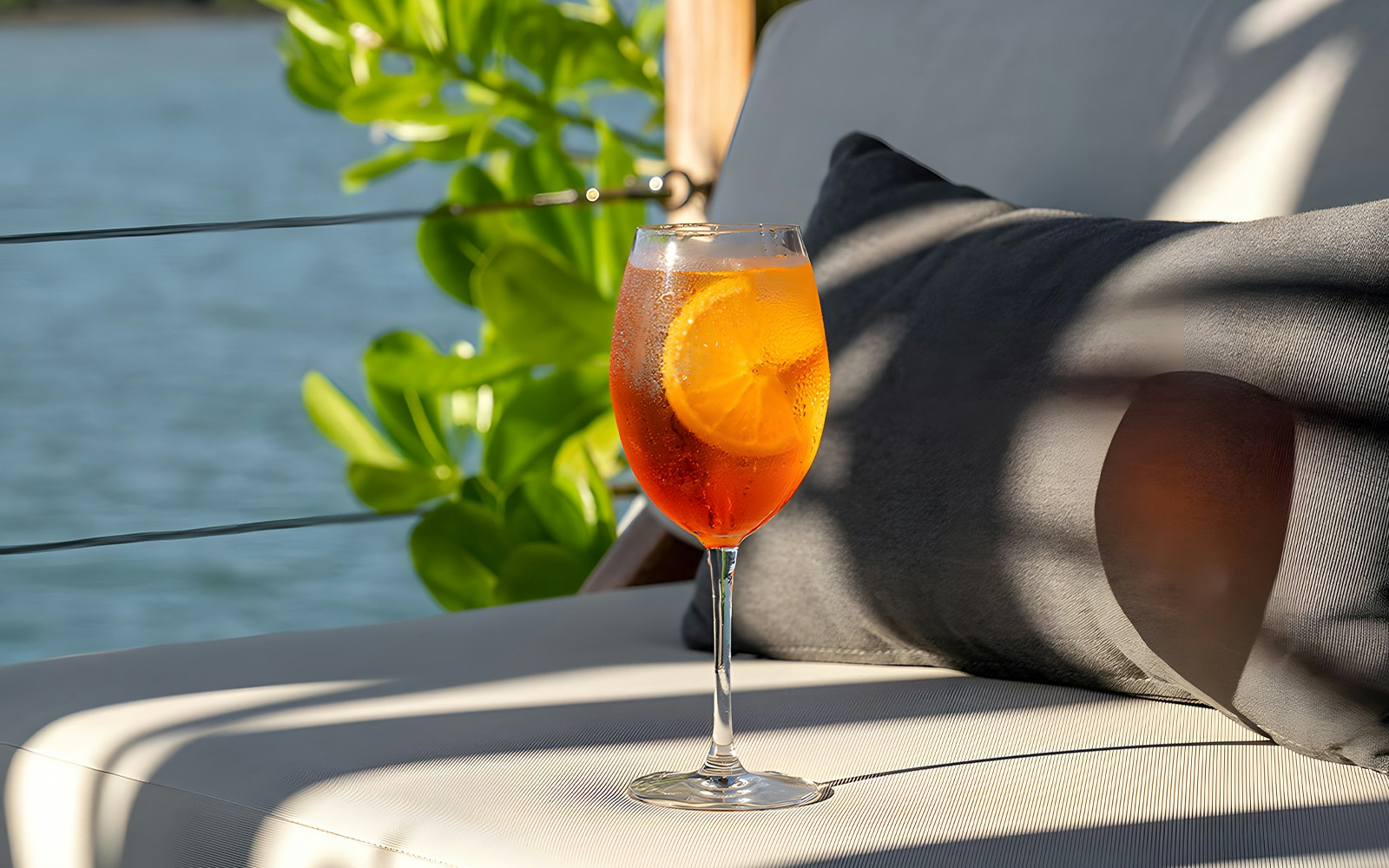 Visitors enjoying the sunset at Yona Beach Club Experience in Phuket, a unique beach club tour offering stunning ocean views and exclusive access