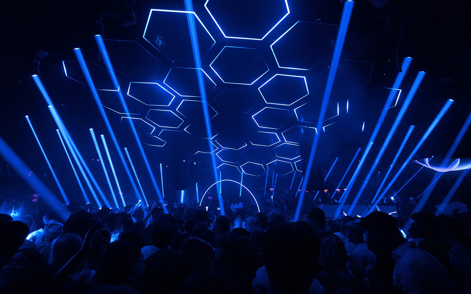 Group of friends dancing in night club