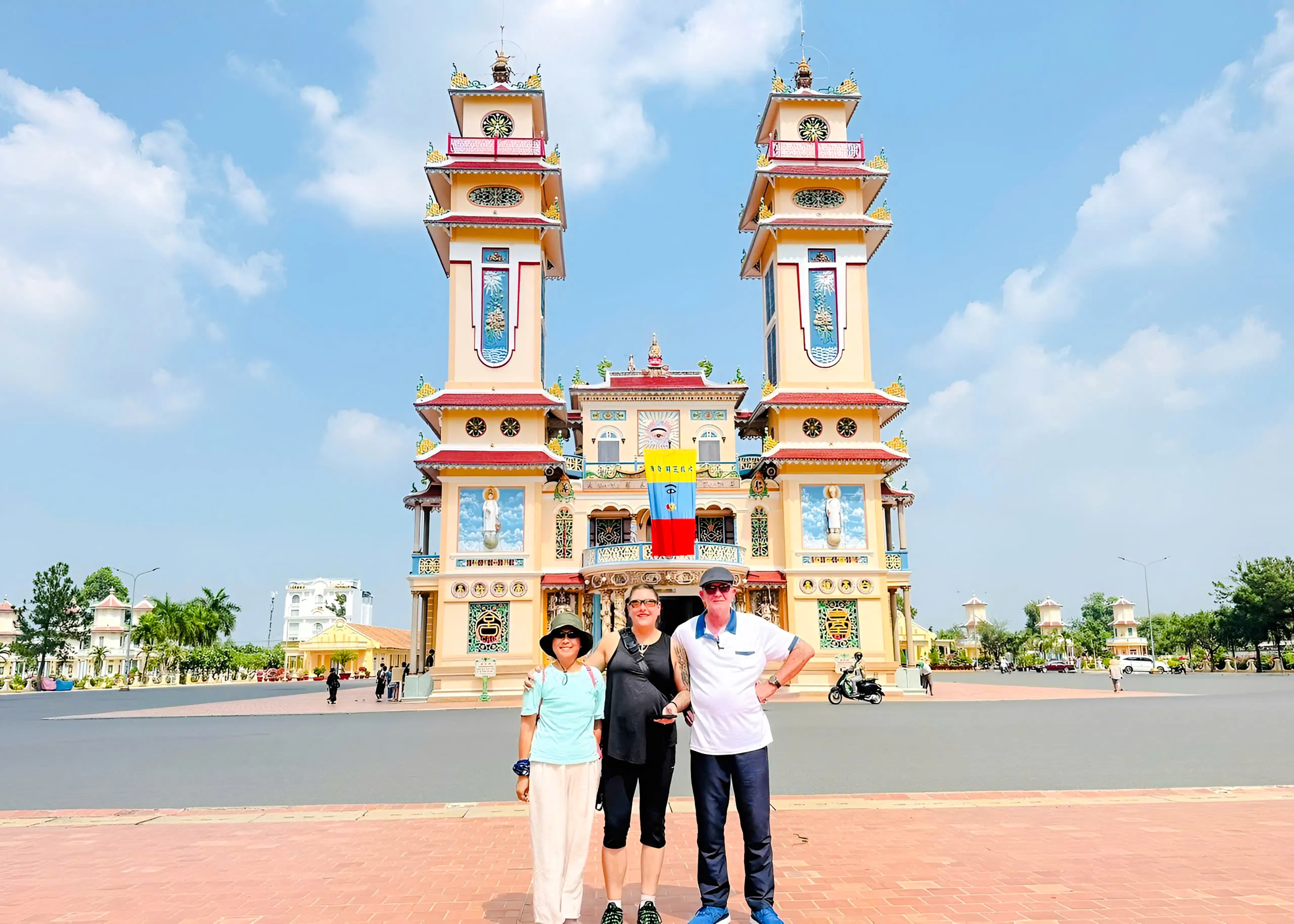 Cao Dai Holy See with visitors in Tay Ninh, near Ho Chi Minh City.
