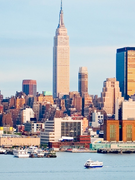 New York skyline with Empire State Building and waterfront view.