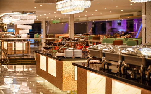 Buffet setup on Bangkok Chaophraya Cruise dining area.
