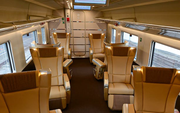 Luxurious seating inside an Italian high-speed train, Italy train pass.