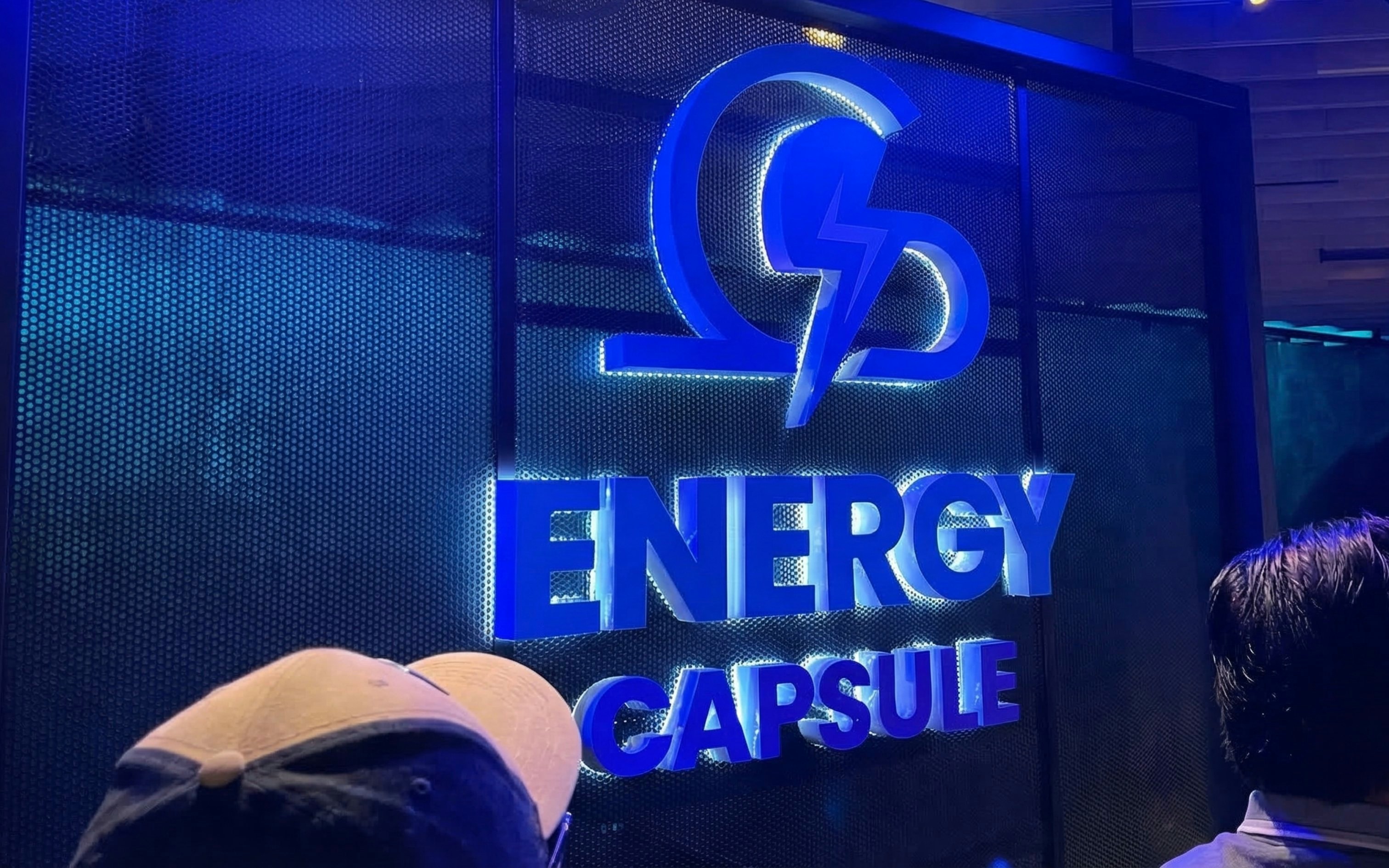 Energy Capsule sign with lightning bolt logo at Petrosians exhibit.