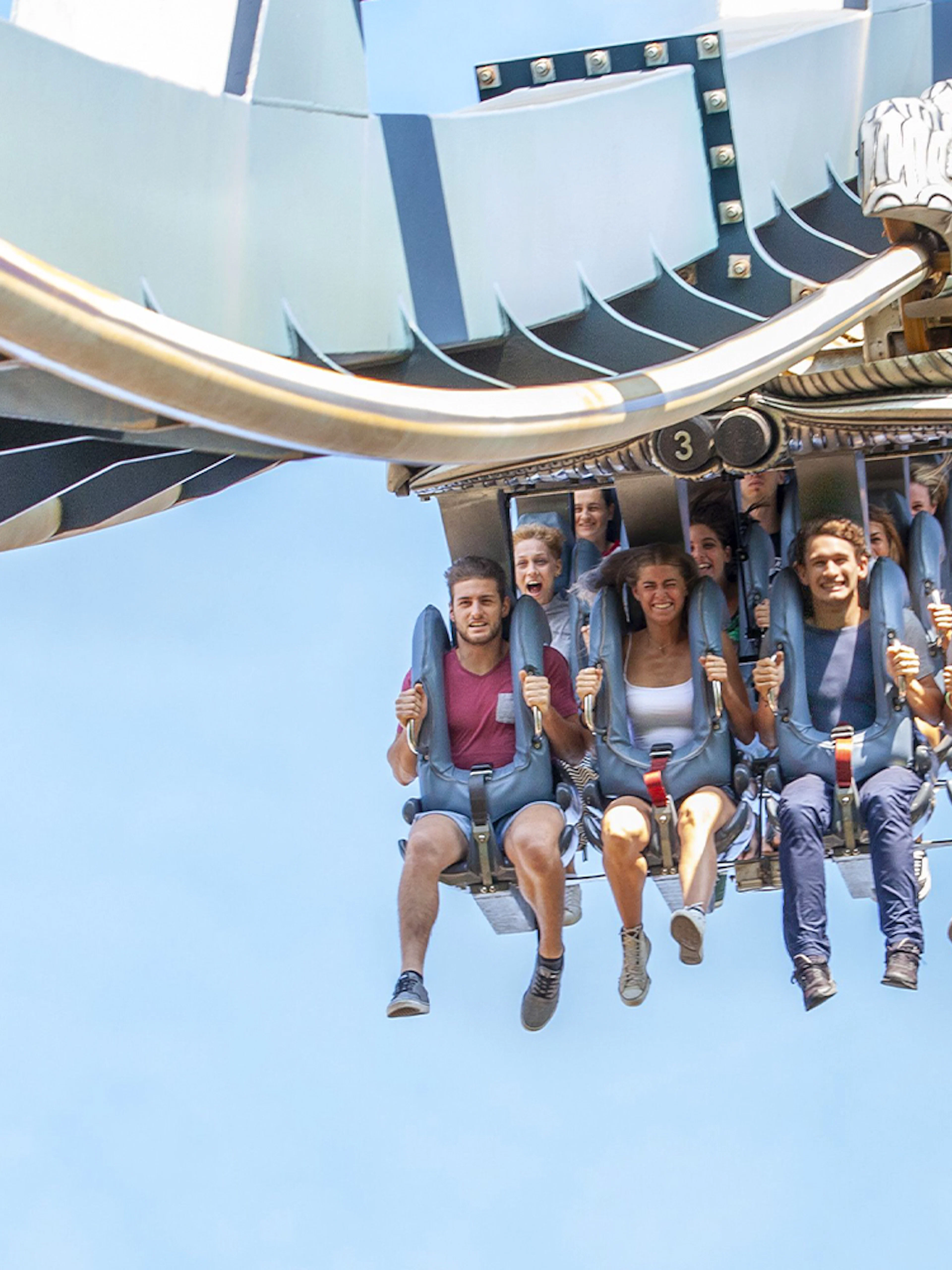 Visitors enjoying a roller coaster ride at Mirabilandia Park, Italy.