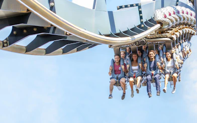 Visitors enjoying a roller coaster ride at Mirabilandia Park, Italy.