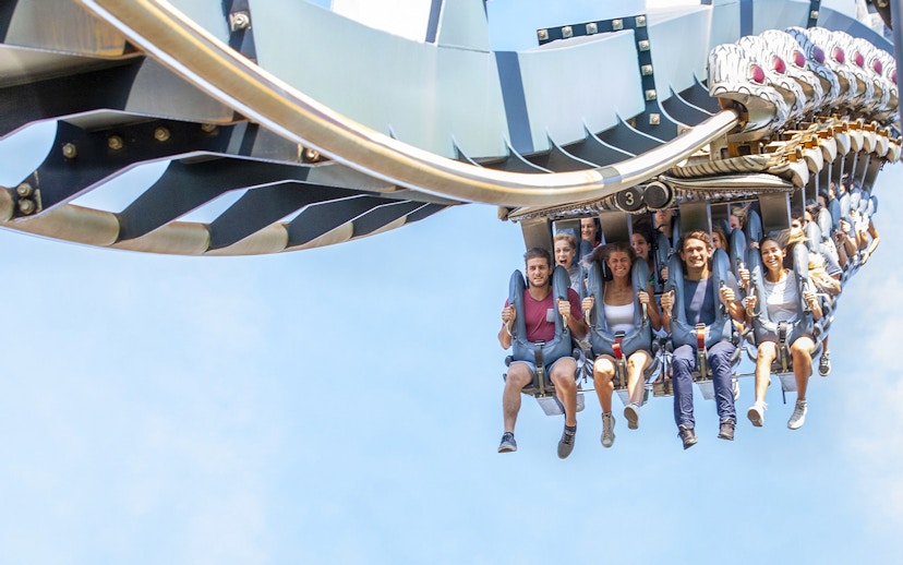 Visitors enjoying a roller coaster ride at Mirabilandia Park, Italy.