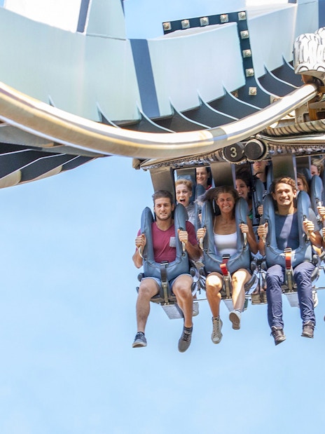 Visitors enjoying a roller coaster ride at Mirabilandia Park, Italy.