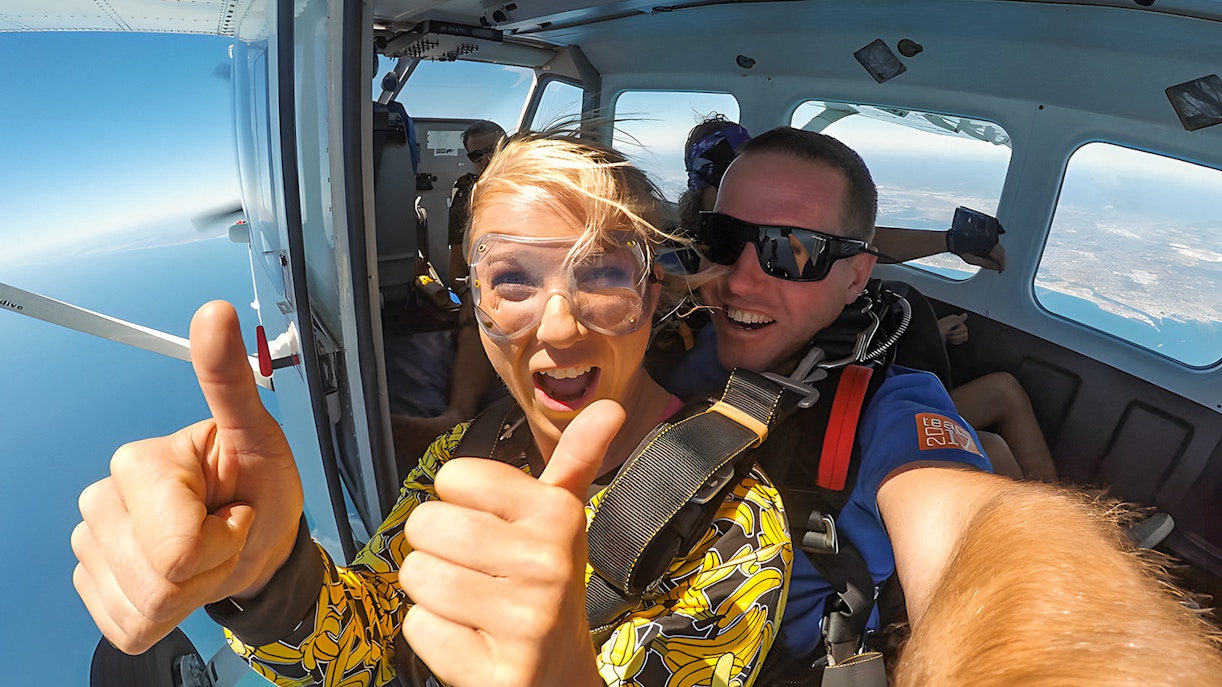 Skydivers preparing to jump from plane over Rottnest Island.
