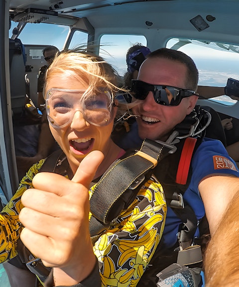 Skydivers preparing to jump from plane over Rottnest Island.