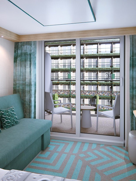 Deluxe Garden View Stateroom with Verandah on Disney Adventure Cruise from Singapore, featuring balcony seating.