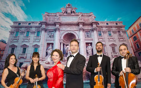 Opera musicians in front of Trevi Fountain at Palazzo Poli, Rome.