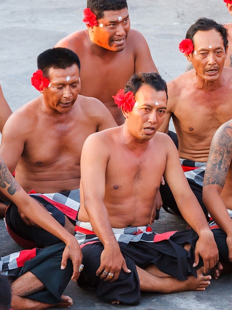 Men performing the Uluwatu Kecak & Fire Dance in Bali, Indonesia.