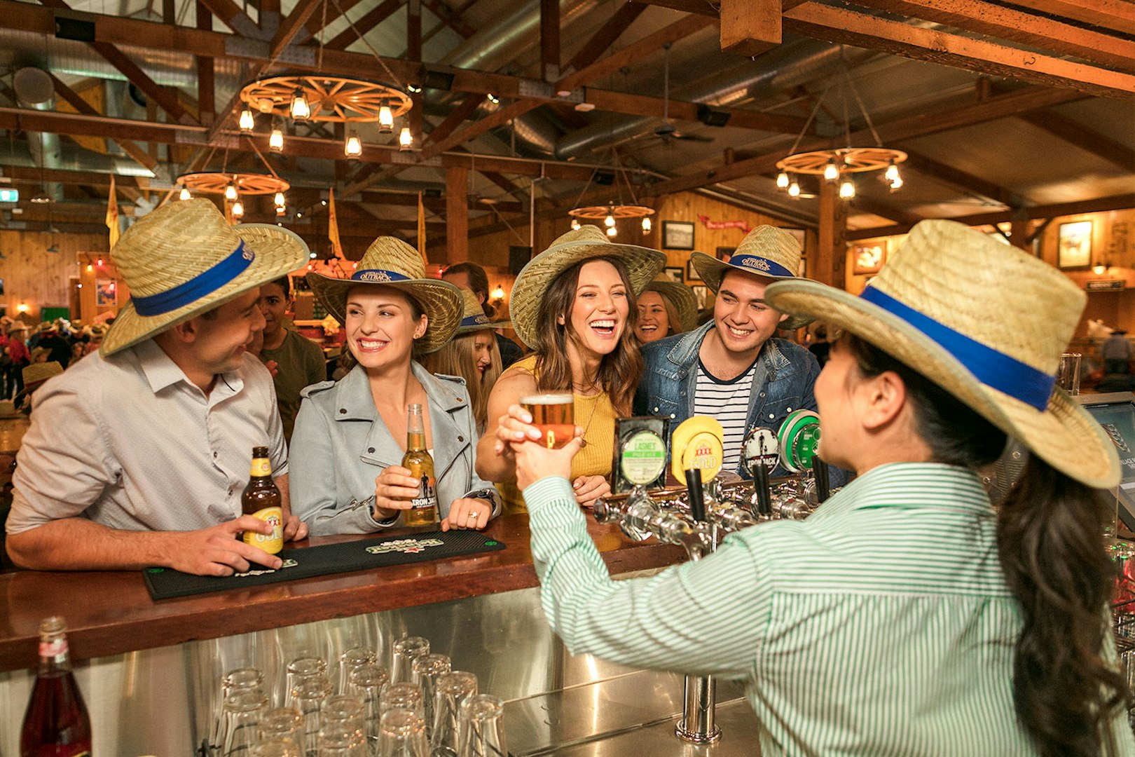 Guests enjoying drinks at the Australian Outback Spectacular Heartland Dinner & Show bar.