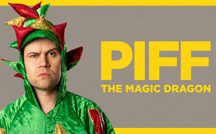 Performer in dragon costume with "Piff the Magic Dragon" text, Vegas show.