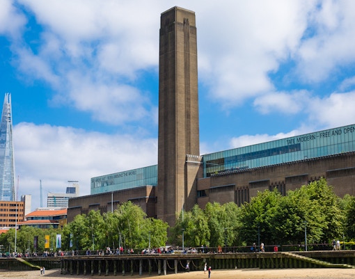 Tate Modern viewed from Thames Sightseeing Cruise, London.
