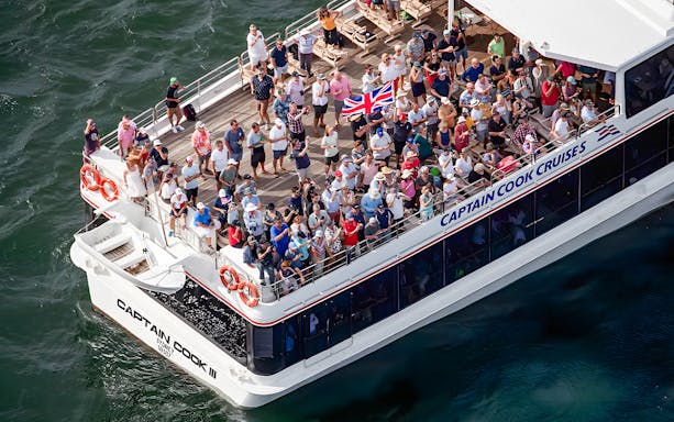 Crowd on Captain Cook cruise ship during Sydney New Year's Eve dinner cruise.
