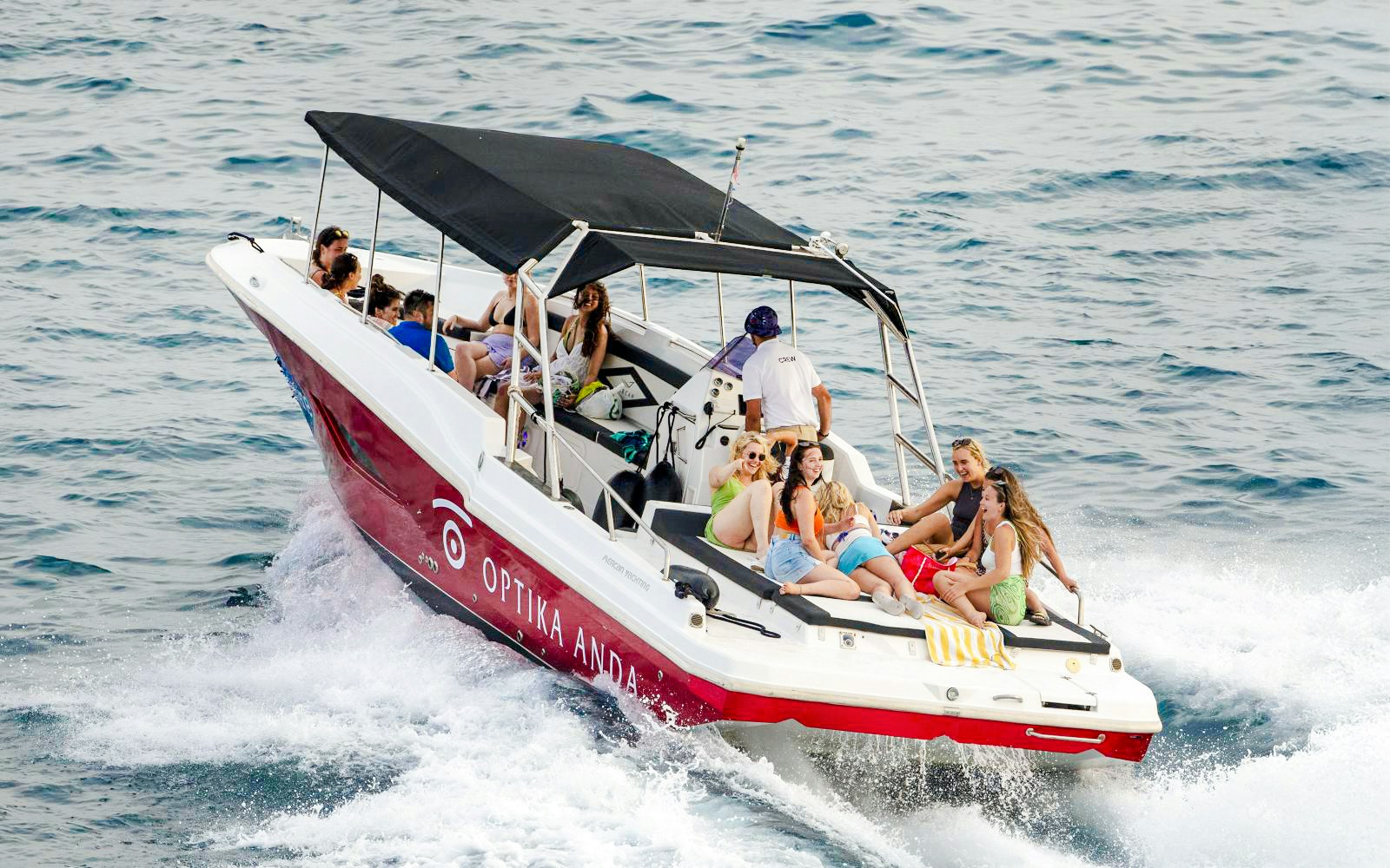 Speedboat with tourists heading to Blue Caves, Croatia.