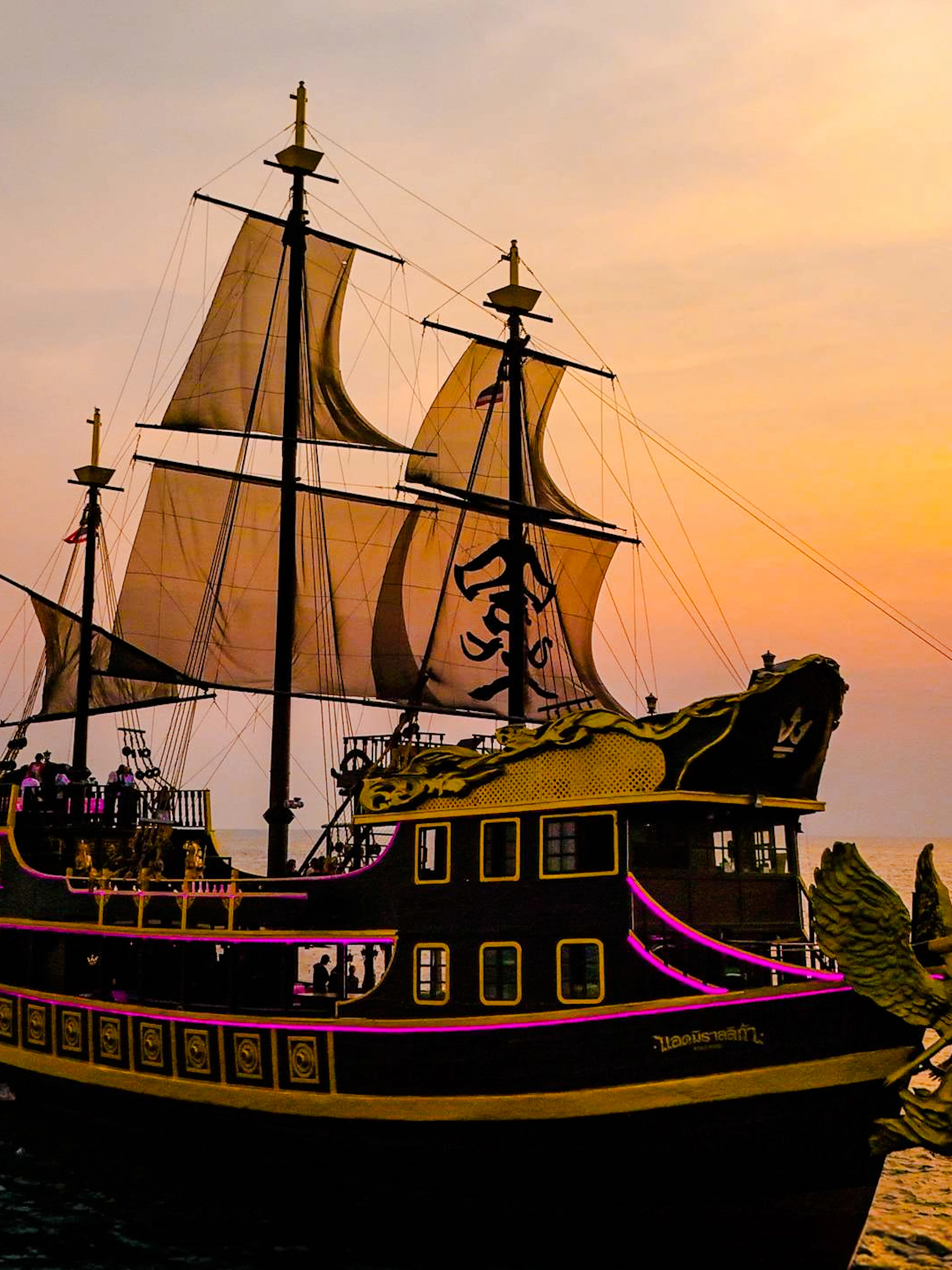 Pirate ship sailing at sunset on the Lord Black Pearl Pattaya day tour.