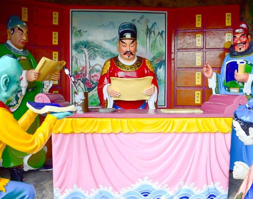 Chin Swee Caves Temple pagoda surrounded by lush greenery in Genting Highlands, Malaysia.