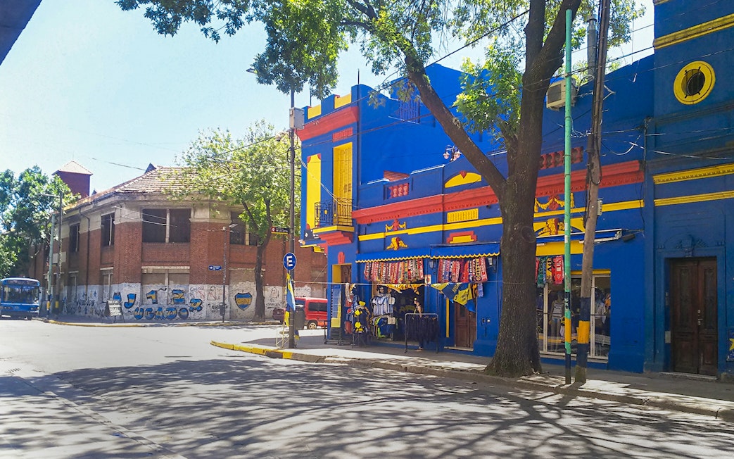 Shop with blue and yellow facade near La Bombonera stadium, Buenos Aires.