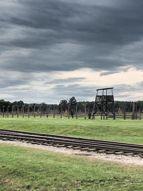 Rail tracks and watchtower at Stutthof Concentration Camp, Poland.