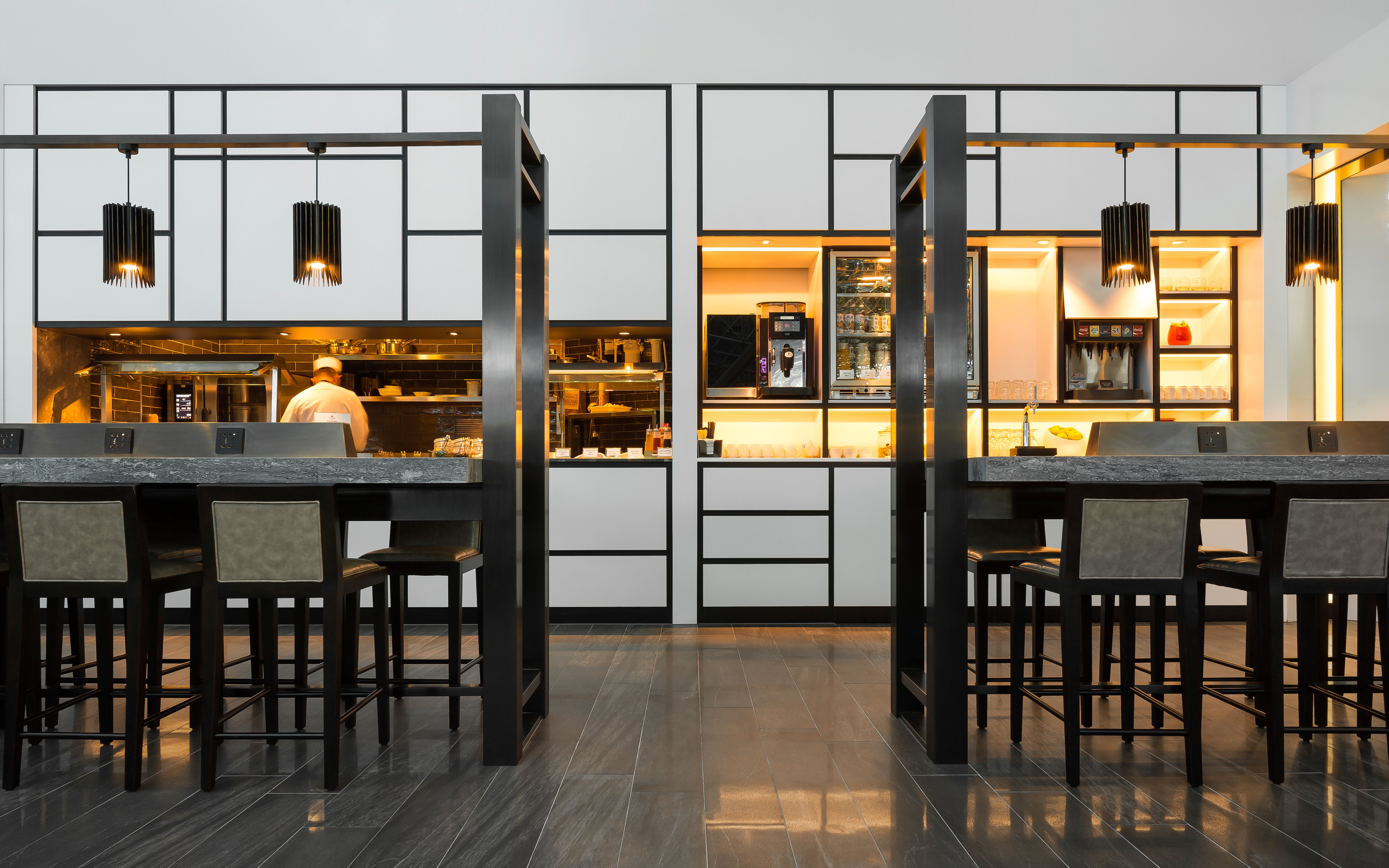 Chef preparing food at Plaza Premium Lounge, Zone A1, Taipei, Taiwan.