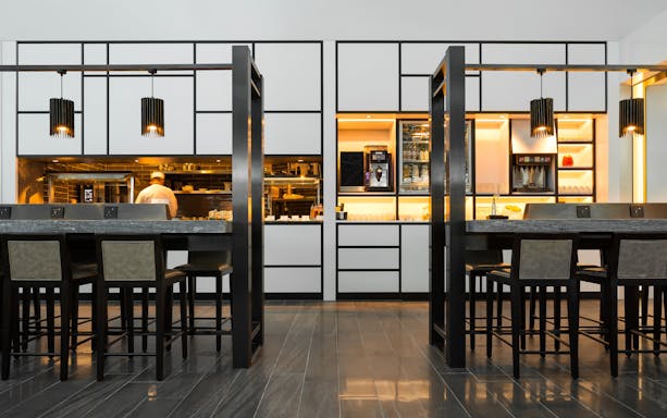 Chef preparing food at Plaza Premium Lounge, Zone A1, Taipei, Taiwan.