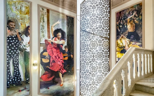 Flamenco paintings in Flamenco De Leones, Madrid, showcasing dancers and musicians.