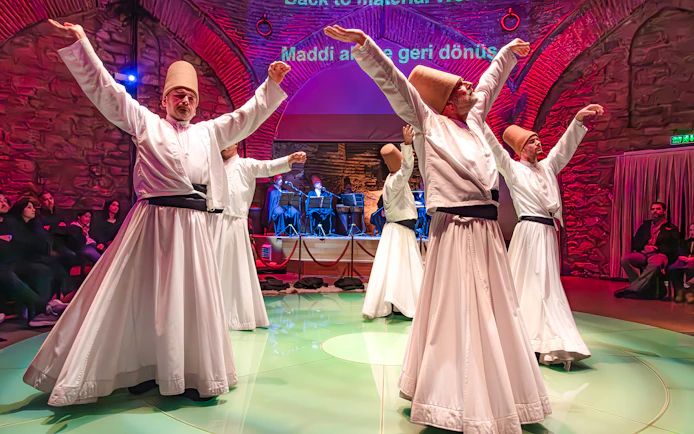 Whirling dervishes performing at Hodjapasha Cultural Center in Istanbul.