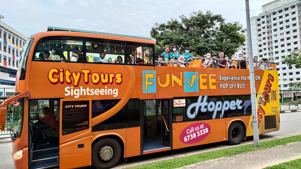 Singapore FunVee Land and Sea Experience with city skyline and iconic Marina Bay Sands in view.