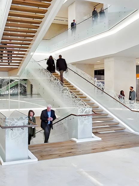 Visitors exploring the modern interior of the Museum of the Bible in Washington, D.C.