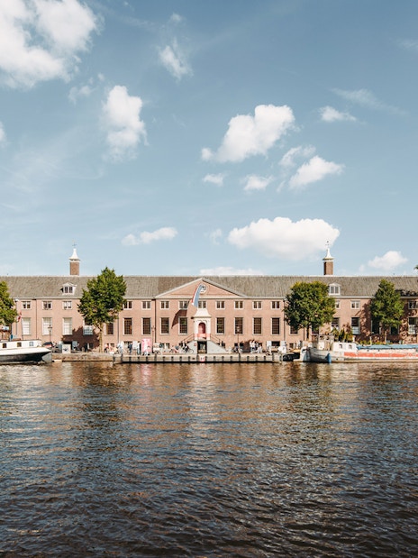 H’ART Museum exterior along the canal in Amsterdam, Netherlands.