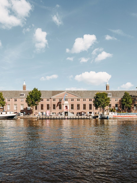 H’ART Museum exterior along the canal in Amsterdam, Netherlands.