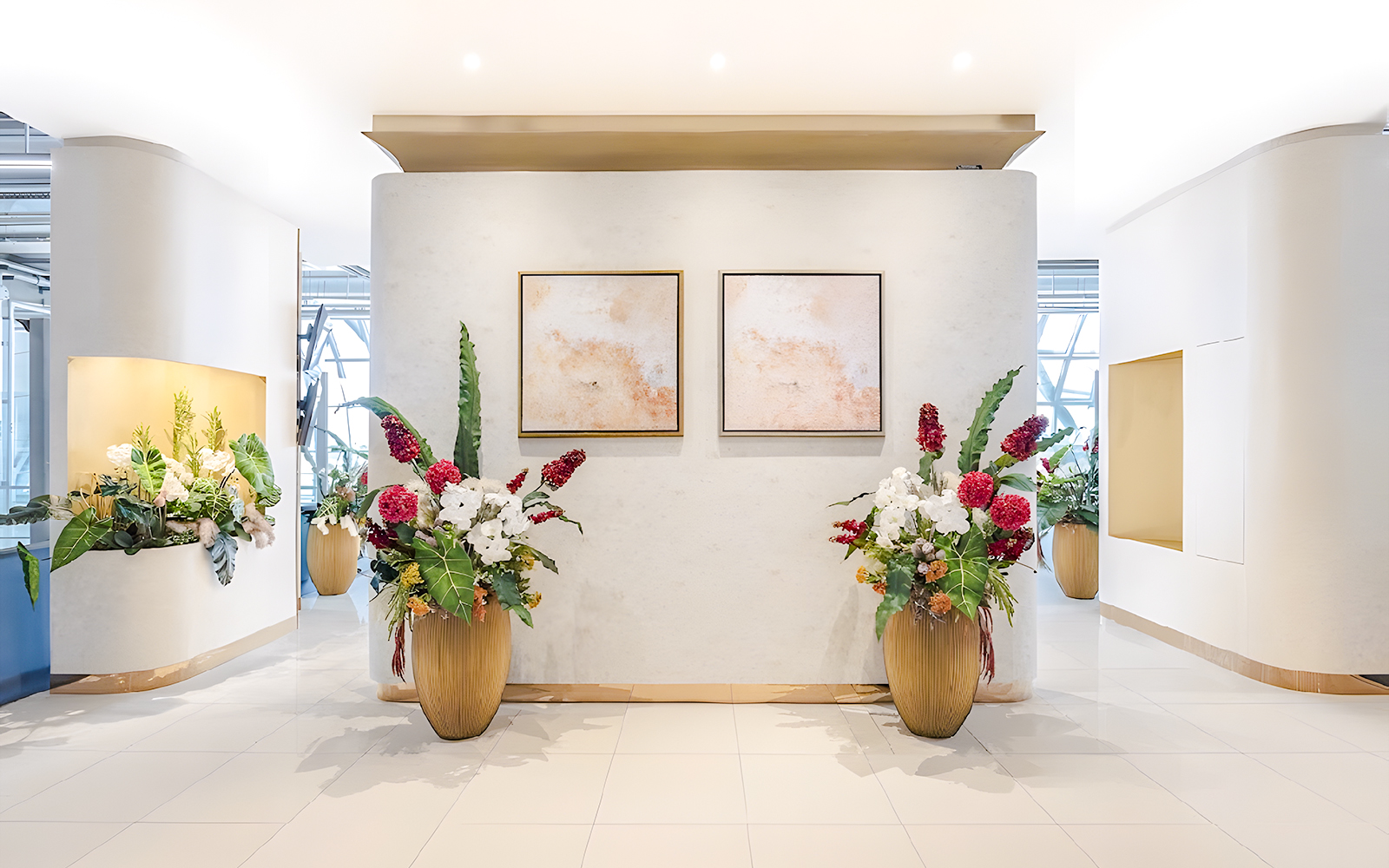 Floral arrangements and abstract art in Miracle Lounge, Bangkok Airport, Thailand.