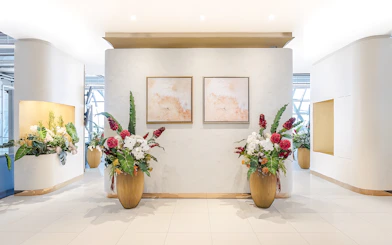 Floral arrangements and abstract art in Miracle Lounge, Bangkok Airport, Thailand.