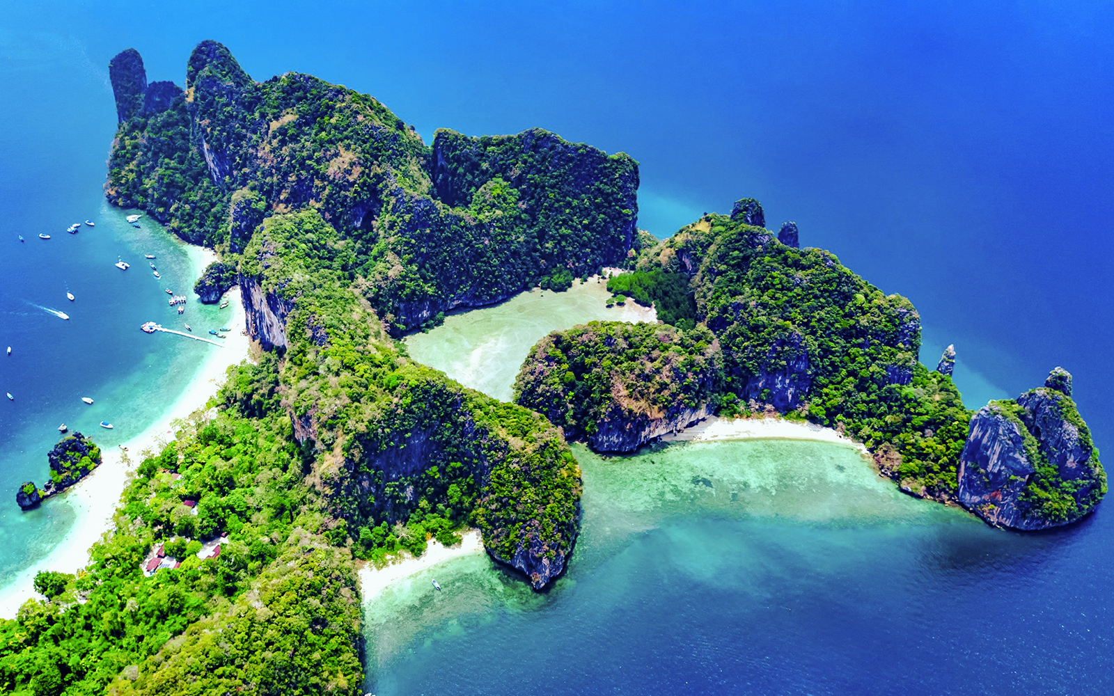 Aerial view of Ko Hong islands with lush greenery and turquoise waters, Thailand.