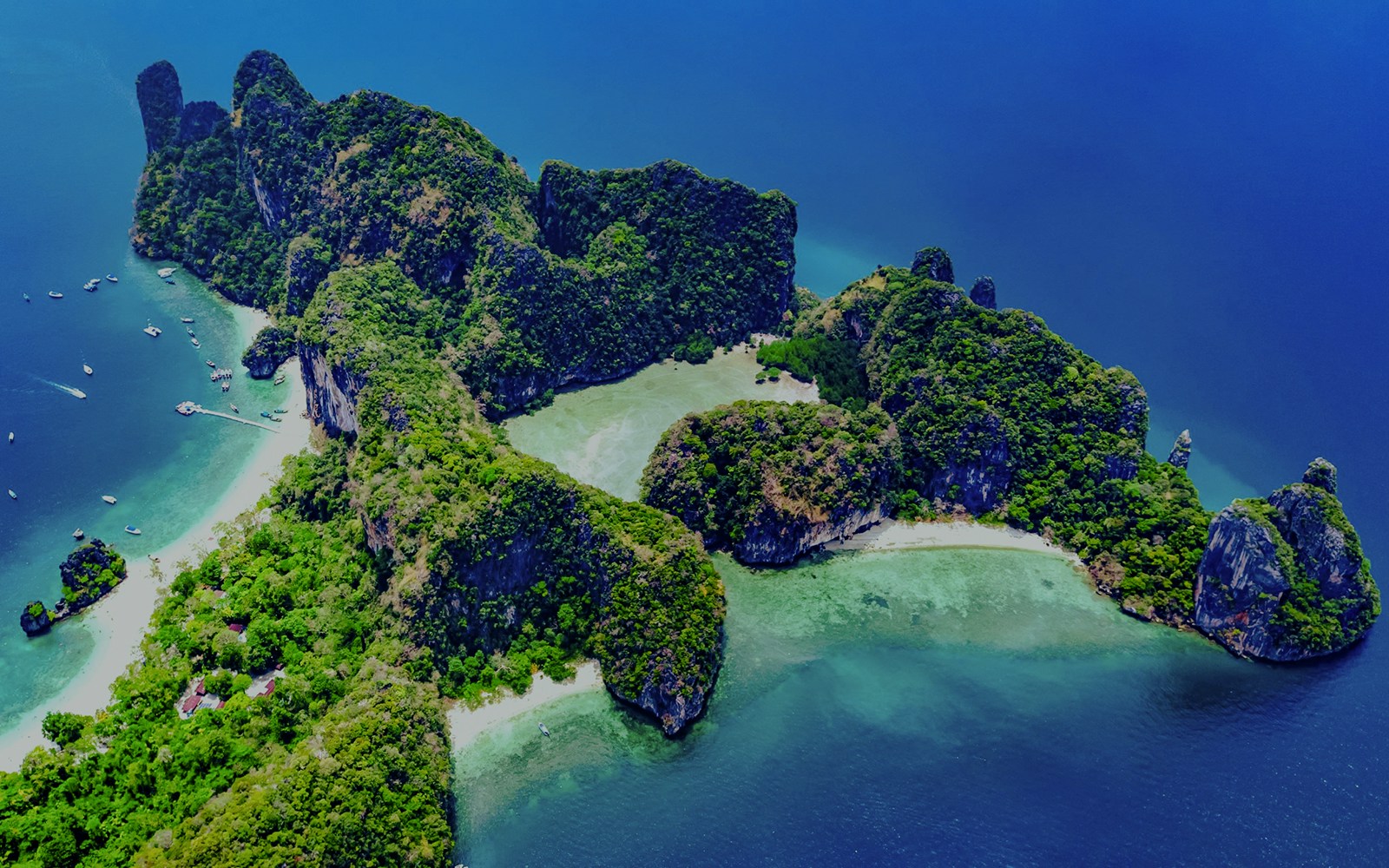 Aerial view of Ko Hong islands with lush greenery and turquoise waters, Thailand.