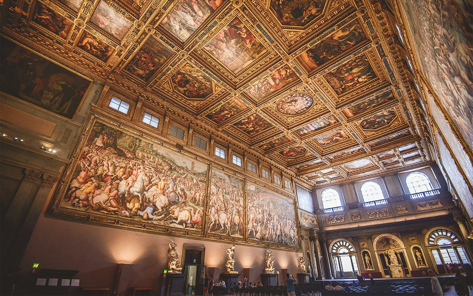 Massive frescoes stretch across Salone dei Cinquecento's walls