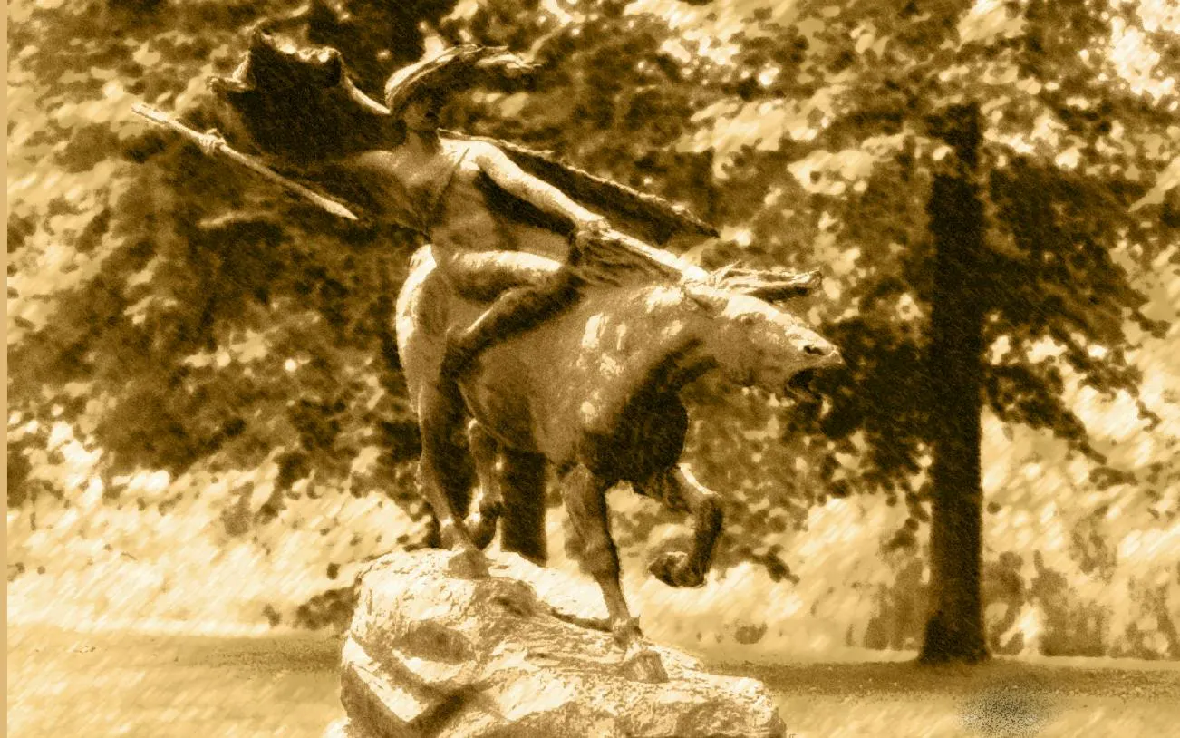 Statue of a rider on horseback in a park, part of Copenhagen Royal District tour.