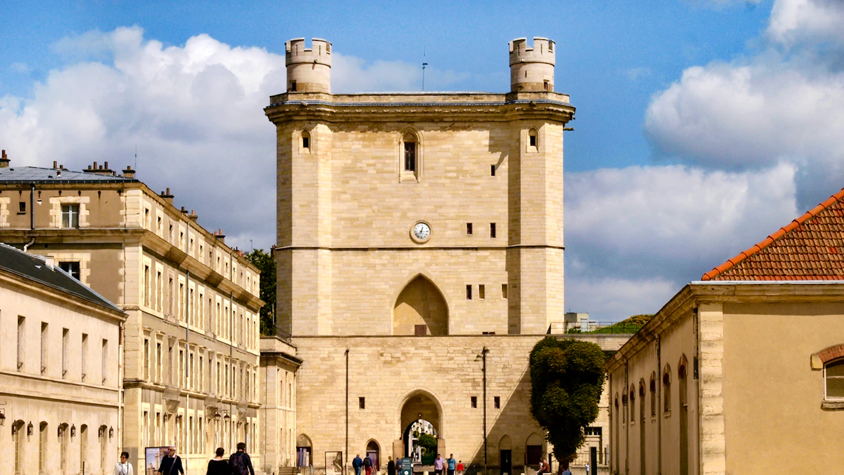 Château de Vincennes entrance with visitors walking nearby, Paris, France.