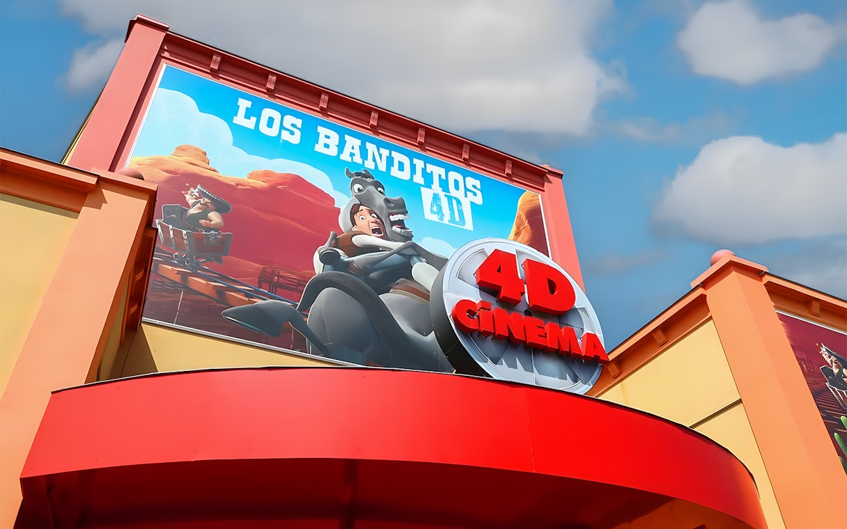 4D cinema entrance at Walibi Belgium featuring Los Banditos ride poster.