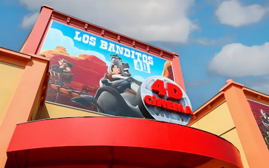 4D cinema entrance at Walibi Belgium featuring Los Banditos ride poster.